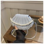 Aesthetic trend, personality indentation, 2025 autumn new fashion, simple pearl hand-held crossbody, shell bag for women - Blue
