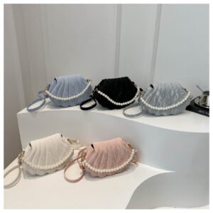 Aesthetic trend, personality indentation, 2025 autumn new fashion, simple pearl hand-held crossbody, shell bag for women
