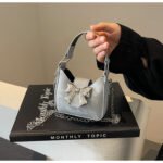 Niche bow handbag, new spring and summer trend, sweet and cool mini lipstick, chain bag, crossbody mini small bag for women